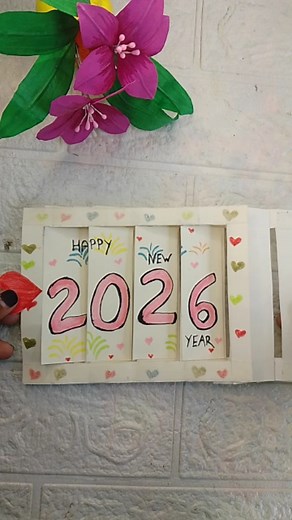 Diy/ Art/ Craft ❤️🤍 on Instagram: "Diy New Year Card 2026 ❤️❤️Handmade Slider Card / diy/ New year slider card Made this beautiful New Year Slider Card with love 💖 Simple, creative & perfect for New Year wishes 🎊✨ If you love handmade crafts & DIY ideas, follow for more 💫 Like ❤️ Share 🔁 Save 💾 #newyear2026#newyearcraft #slidercard #handmadecard #diycraft"