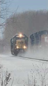 Great Meet: CSX train I161 with new paint ES40DC meets local power L356 in snow storm! 11626