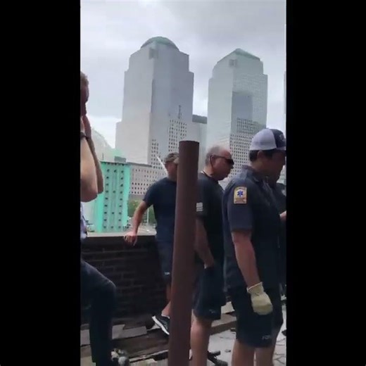 FDNY Forcible Entry Door Delivery Engine 10 / Ladder 10 in front of the Freedom Tower by crane.