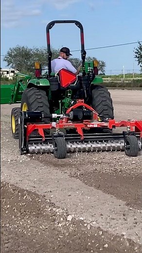 Testing a John Deere tractor with a power rake
