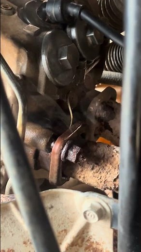 Yamaha grizzly 660 leaking fluid though exhaust what could be the problem #yamahagrizzly