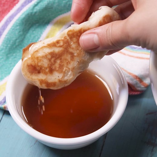 Bacon Pancake Dippers are the savory sweet breakfast you didn't know you needed. Full recipe: http://dlsh.it/B1WKXSU | Delish