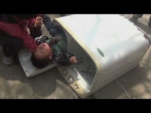 Two-year-old boy rescued from washing machine