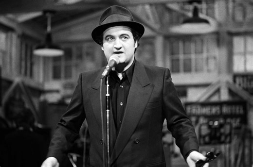 John Belushi Visited His Castmates' Graves in SNL's "Don't Look Back in Anger" Film