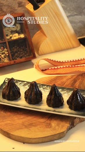 This Ganesh Mahotsav, serve Bappa's favourite Modaks in a new andaaz! Here's a unique recipe to make yummy Choco Chip Modaks. Share this delicious recipe with your friends and family! Don Bosco Hospitality! For any enquiries Call / WhatsApp: 99760 23007 video credits: sunshine #ganeshchaturthi #ganeshutsav #modak #recipe #delicious #chololate #chocochip #donboscohospitality | Don Bosco College of Hospitality | Facebook