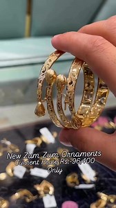 Beautiful bangle pair available, call 9149 467959 | New Zum Zum Ornaments
