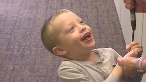 Brooks Brown helps his mom Truman State softball coach Erin Brown out with her interview | Fred Beck KTVO