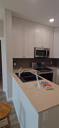 Top Floor Condo with Vaulted Ceilings for Under $220K