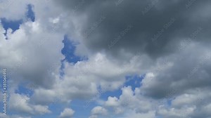 Dramatic stormy dark grey clouds & moody scary white cloudscape before thunder rain storm or hurricane in monsoon season or autumn rainy day on creepy atmospheric horizon, Slow Motion B-roll TimeLapse