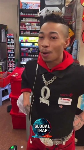 GAS STATION CLERK WEARING A O BLOCK CHAIN