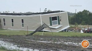Severe storms slammed parts of the Plains leaving behind destruction. This mobile home was overturned; power lines and trees fell, as reported winds up to 70 miles per hour swept across the region. | America's Morning Headquarters