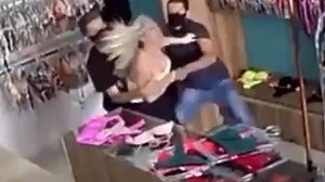 Shocking moment shop owner tied up and robbed in Brazil