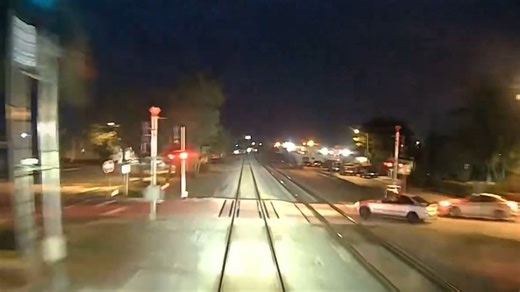 Video shows train colliding with vehicle attempting to go through railroad crossing