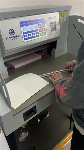 A unit of AT551-09 flagship v2.0 hydraulic paper cutter and 900H flagship perfect binder