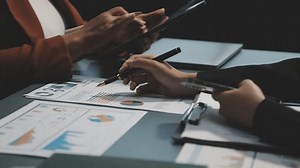 Accountant or banker making calculations Bookkeeper Clerk, Bank Advisor And Auditor. Accounting concept.