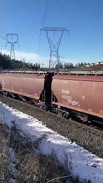 CSX leading BNSF X-TAC in the snow on February 12th, 2025