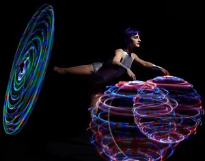 Watch this trippy LED hula hoop routine