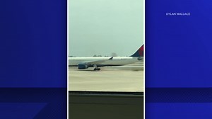 Delta plane catches fire at Orlando International Airport
