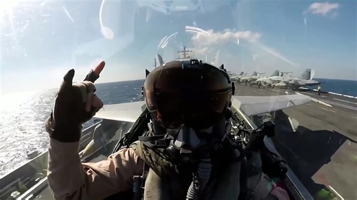 Fighter jet catapult launch from aircraft carrier