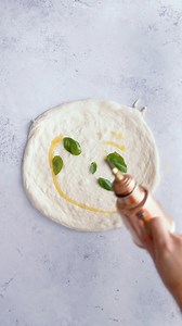 So many people keep telling me when I should put basil on pizza. Here’s the truth: I’ve always put basil on before the bake right after the sauce and then I cover it with cheese and a drizzle of oil. That way, it doesn’t burn and it releases this amazing aroma into the pizza. And yes, I also add some fresh basil after the bake. That’s it. There’s no strict “right” or “wrong.” It’s all about what you like. | Rene's Sourdough