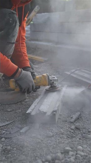 Smoothing a Concrete Block with an Angle Grinder