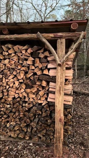 Rustic firewood shed made out of cedar logs and metal roof. #firewood #storage #shed #rustic