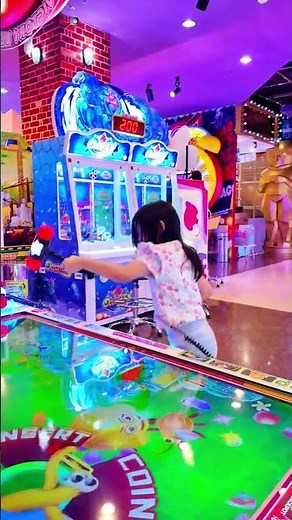 Giera Playing a Fun Hammer Arcade Game