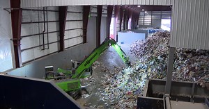 Why does so much recyclable material end up in the trash in Chicago?