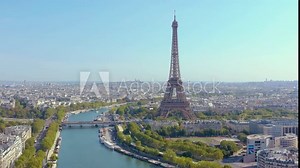 PARIS, FRANCE - MAY, 2019: Aerial drone view of Eiffel tower and Seine river in historical city centre from above.