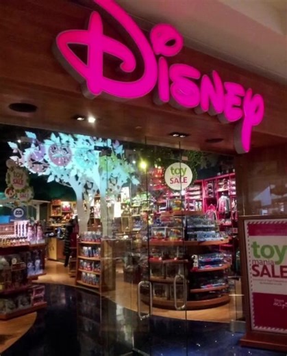 The 90s Disney Store was a literal sanctuary. 🏰✨ POV: It’s 1998, your parents are at Macy's, and you’re parked in front of the giant movie screen in the back. 📺 I can still smell the plastic toys and the glitter from the princess costumes. 👑 That plushie mountain was the ultimate test of self-control. 🧸 Who else spent their entire mall trip right here? 🙋‍♀️✨ #disneystore #malllife #90skid #millenialnostalgia