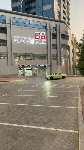 Exploring Urban Life in a Stylish Yellow Convertible