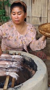 A woman Grilled Octopus for two dogs - Cooking octopus for dogs Eating | Living And Cooking