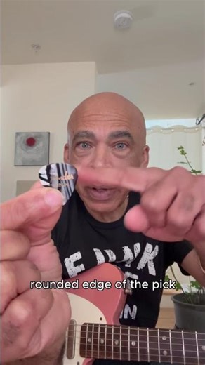 Which side of the pick do you use when playing guitar? #guitar #guitarist