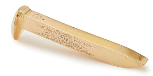 Golden Alaska Railroad spike to return to state