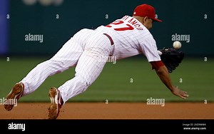 Philadelphia Phillies third baseman Placido Polanco tries to reach an RBI-single by Los Angeles Dodgers' Matt Kemp in the first inning of a baseball game, Thursday, Aug. 12, 2010, in Philadelphia. (AP Photo/Matt Slocum Stock Photo - Alamy
