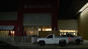 Driver hospitalized after crashing into American Girl store