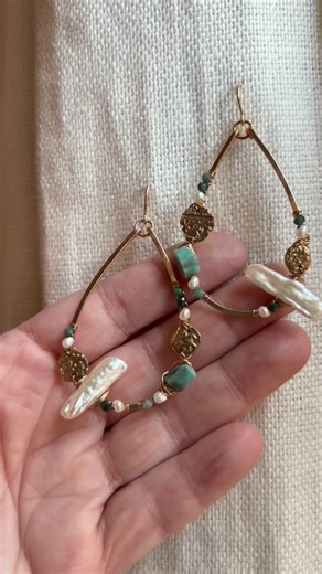 These were so fun to make. The “Found Object” set. Bronze is wire wrapped with Brazilian emeralds, pearls, tiny jade beads and bronze “found object” elements. We wanted to make something that might have been made from items collected in a tide pool or a bog🪾🍃 | Modern Bronze