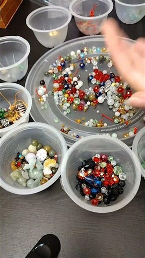 🔔 sorting beads ✨ #beads #iridescent #craftsupplies #beading #shorts