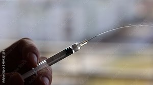 Adrenaline injection shot syringe macro Stock Video