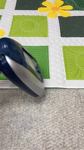 Tired of your quilts hanging wonky? Here's how I sort out wavy sides, both before and after binding. But... I have had a few quilts that refused to hang straight, no matter how much I steamed, soaked, blocked, or fussed with them. The issue in those cases involved: 1. Inconsistent quilting - The overall amount of machine quilting needs to generally be consistent through the quilt. If you quilt the center of a quilt densely with Stippling, but don't quilt the borders at all, the quilt won't hang 