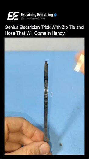 rahulyadav | Explaining Everythinng on Instagram: "The hardest job in wiring: threading a cable through complex, tight conduit runs. This genius electrician trick solves it by improvising a fish tape. The rigid zip tie is fed into the hose/tubing, instantly creating a stiff, extended guide. This simple, flexible assembly is used to accurately guide difficult wires through long or curved sections. It transforms frustration into a simple, precise pull. It’s low-cost, essential engineering that unl