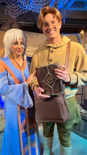 Joanna on Instagram: "I asked a Cast Member what I should ask Milo & Kida at the Atlantis meet and greet and she said, “Ask Milo what’s inside his bag.” While we were waiting in line, we started giggling and decided the only logical answer was… a lobster 🦞 because if you know Atlantis, YOU KNOW. Had to test the theory at Sweethearts’ Night 💙✨ #Disney #Disneyland #Disneypark #Atlantis #SweetheartsNite"