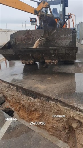 backhoe loader & wheel loader working _ water- shorts