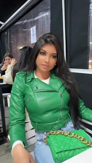 Stylish Conversation in a Bright Green Leather Jacket