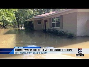 Homeowner builds levee to protect home