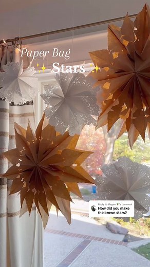 Replying to @Megan 🧚‍♀️ These beautiful paper bag stars ⭐️ are one of my favorite easy holiday decor DIYs! Each year I like to make a few more to add to the collection, and this year I may try using white paper bags as well! They look lovely as window decorations, on the Christmas tree, attached to garlands, and all over bookshelves and banisters! 🎄They’re so simple and affordable to do, and make a great kids craft too! #christmasdecor #paperbagstar #paperbagstars #holidaycrafts #holidaydiy #c