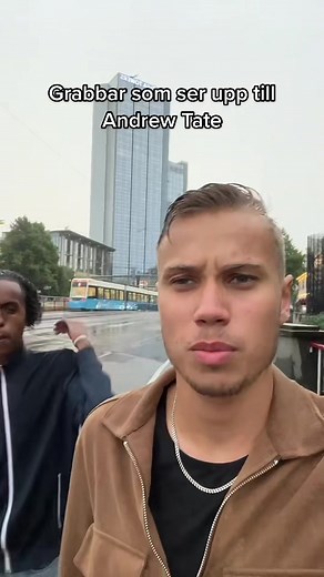 Individuals in Cityscape with Stylish Jackets