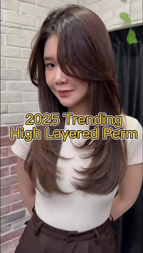 2025 Hair Trend Alert: High Layered Perm! The hottest perm trend of 2025! This style is all about volume, movement, and that effortlessly chic vibe. The high layers create a natural lift, giving your hair a weightless look that frames the face beautifully. This perm adds the perfect amount of texture and dimension to any length! Why we love it? ✨ Adds volume & shape ✨ Low-maintenance styling ✨ Suits all face shapes ✨ Perfect for that trendy, lived-in look! Ready to switch up your style for the n