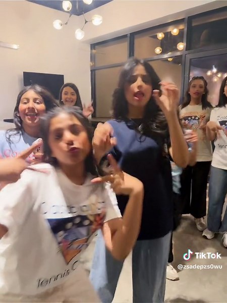 Coordinated Dance Routine in Modern Studio Setting