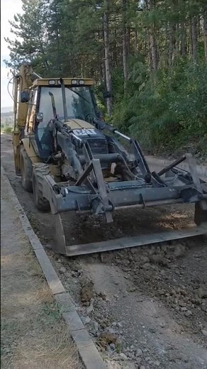 Easy backhoe road grading